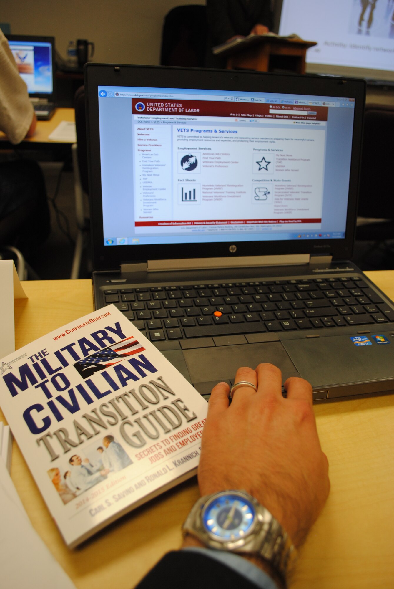 A future Air Force retiree uses a laptop to browse the Veterans' Employment and Training Service page provided by the U.S. Department of Labor website May 13, 2015, at the Airman & Family Readiness Center on Grand Forks Air Force Base, N.D. Service members from any U.S. military branch are given the option of using their own personal laptops or may borrow one from the A&FRC, which they can use to conduct job searches, type resume and review and update electronic records during the Transition Assistance Program seminar. (U.S. Air Force photo by Staff Sgt. Luis Loza Gutierrez/released)