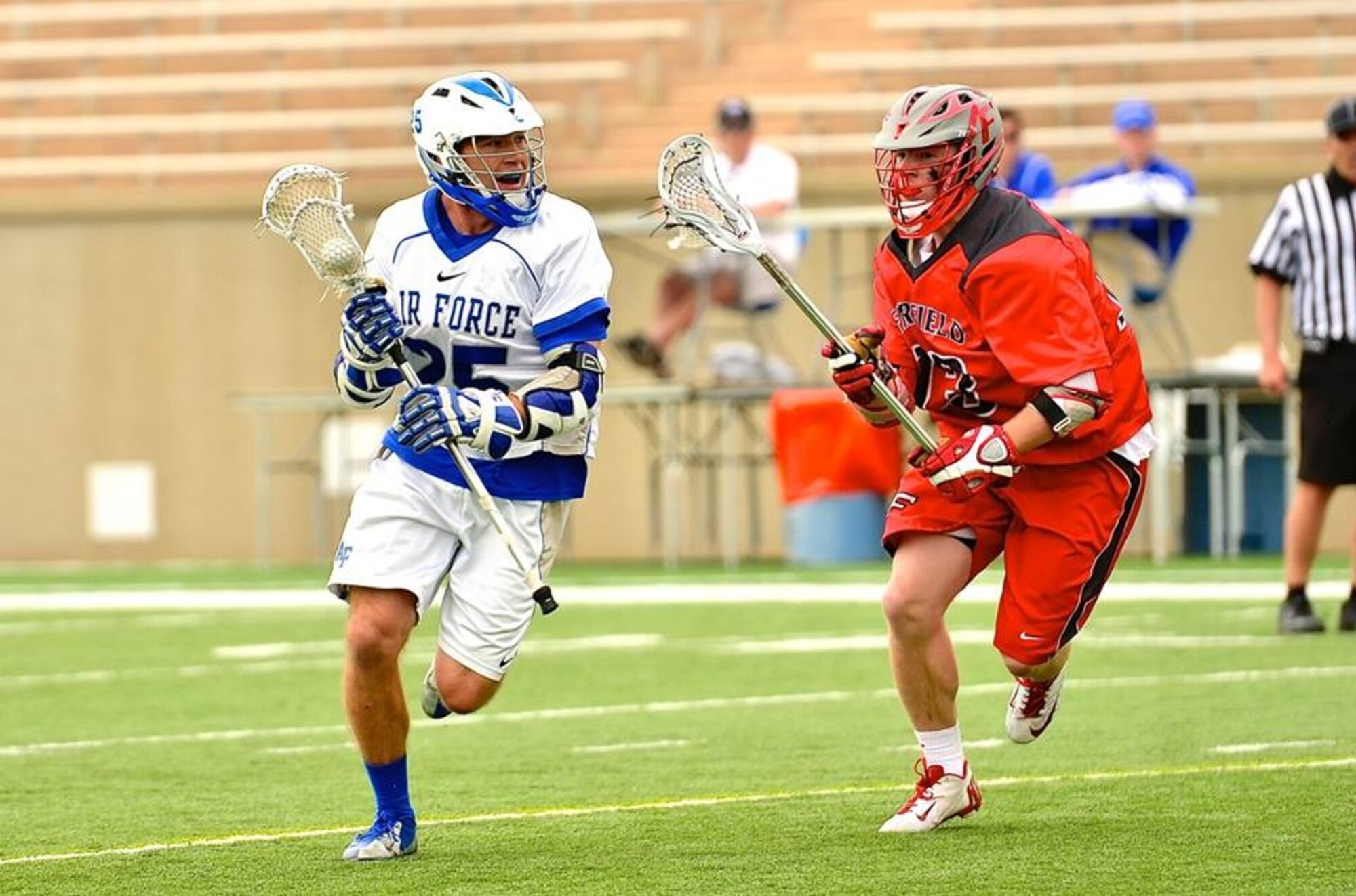 U.S. Air Force Academy Falcons Cadet Eric Smith drives the ball past a Fairfield University player during a game at the Academy that the Falcons won 16-8, April 12, 2014. During the game, Smith had two goals, three assists and a team-high six ground balls, (Courtesy photo)