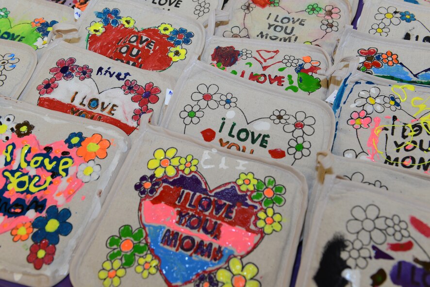 Potholders rest on a table during the Youth Program Mother’s Day tea May 8, 2015, at Moody Air Force Base, Ga. Children in the Youth Program decorated the potholders as gifts for their mothers. (U.S. Air Force photo by Airman 1st Class Kathleen D. Bryant)