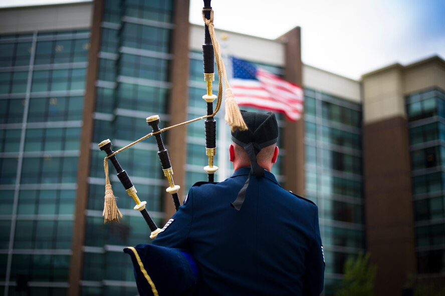 Tech. Sgt. Adam Tianello, U.S. Air Force Band bagpiper, performs during a wreath laying ceremony for National Police Week on Joint Base Andrews, Md., May 11, 2015. The ceremony honored security forces and military police who have paid the ultimate sacrifice in the line of duty. (U.S. Air Force photo/Staff Sgt. Chad C. Strohmeyer) 