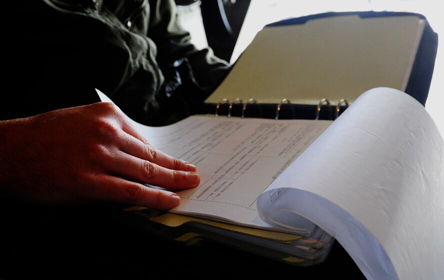 Master Sgt. Michael Czap, a flight engineer supporting the 413th Flight Test Squadron, reviews the aircraft maintenance and configuration forms to ensure there is no outstanding issues before the CV-22 Osprey is prepped for takeoff at Hurlburt Field last month. The CV-22 is a tiltrotor aircraft that conducts long-range infiltration, exfiltration and resupply missions for special operations forces. The 413th FLTS, based out of Hurlburt Field, provides developmental test and evaluation for special operation aircraft including the CV-22. (U.S. Air Force photo/Airman 1st Class Andrea Posey)