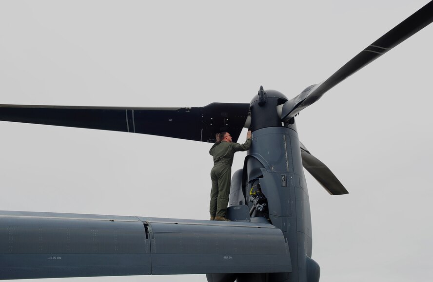 Master Sgt. Michael Czap, a flight engineer supporting the 413th Flight Test Squadron, examines a proprotor during preflight operations on the CV-22 Osprey before takeoff at Hurlburt Field last month. The CV-22 is a tiltrotor aircraft that conducts long-range infiltration, exfiltration and resupply missions for special operations forces. The 413th FLTS, based out of Hurlburt Field, provides developmental test and evaluation for special operation aircraft including the CV-22. (U.S. Air Force photo/Airman 1st Class Andrea Posey)