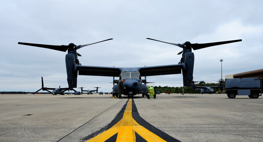 Master Sgt. Michael Czap, a flight engineer supporting the 413th Flight Test Squadron, examines the CV-22 Osprey before takeoff at Hurlburt Field last month. The CV-22 is a tiltrotor aircraft that conducts long-range infiltration, exfiltration and resupply missions for special operations forces. The 413th FLTS, based out of Hurlburt Field, provides developmental test and evaluation for special operation aircraft including the CV-22. (U.S. Air Force photo/Airman 1st Class Andrea Posey)