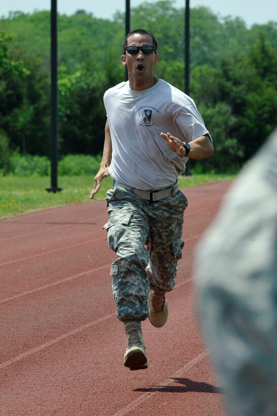 A U.S. Army Soldier sprints a lap during the 1st Defender’s Challenge in recognition of Joint Base Langley-Eustis’ Police Week, at Langley Air Force Base, Va., May 12, 2015. The event was open to all Joint Base Langley-Eustis personnel and all local law enforcement. (U.S. Air  Force photo by Senior Airman Breonna Veal/Released)