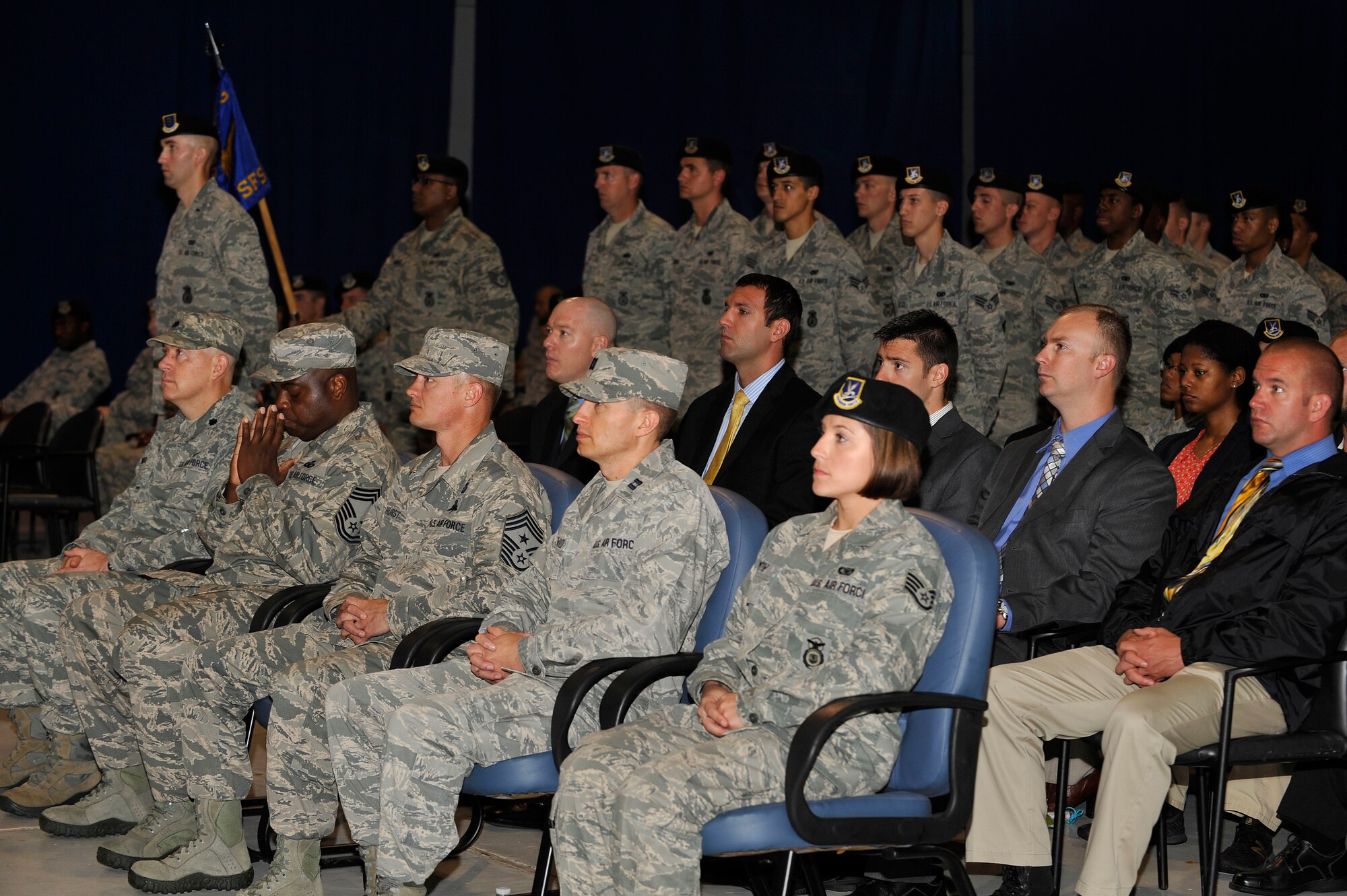 U.S. Service members participate in the 2015 National Peace Officers’ Memorial Ceremony, at Langley Air Force Base, Va., May 11, 2015. Along with the opening ceremony, a Defender’s Challenge, K-9 Competition, weapons display, luncheon and golf tournament took place for Joint Base Langley-Eustis’ Police Week. (U.S. Air  Force photo by Senior Airman Breonna Veal/Released)