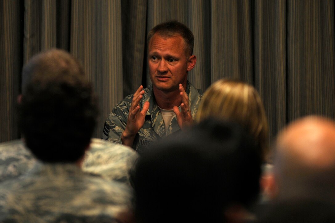 U.S. Air Force Chief Master Sgt. Mark Hurst, 633rd Air Base Wing command chief, speaks about the relationship a command chief should have with his first sergeant during a first sergeants seminar at Langley Air Force Base, Va., May 8, 2015. First sergeants advise their commander on a wide range of topics such as mentoring, professional development and esprit de corps.(U.S. Air Force photo by Senior Airman Breonna Veal/Released)  