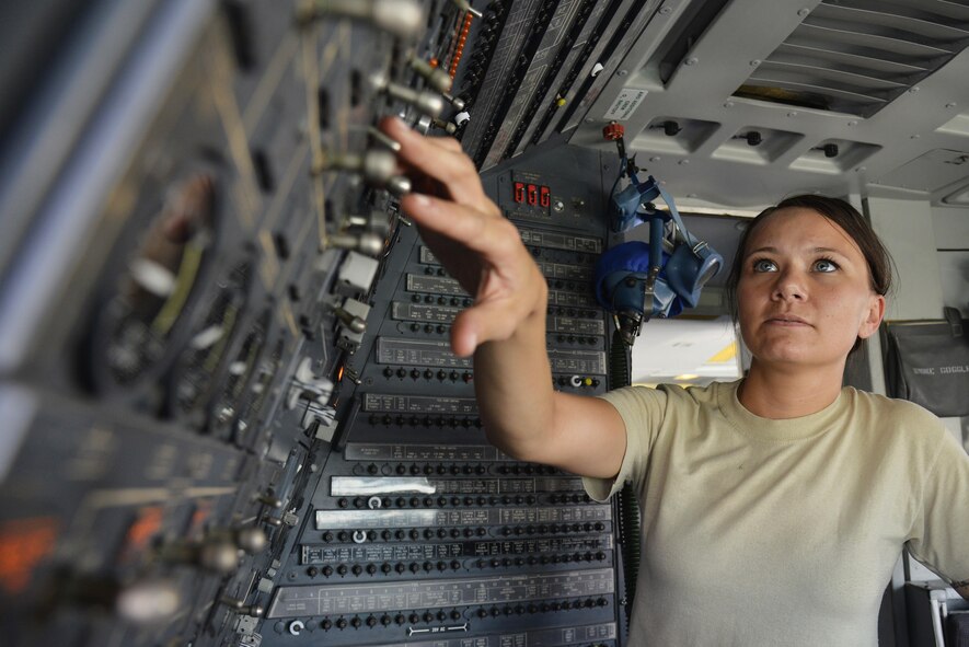 Tech Sgt. Samantha turns on auxiliary power units on a KC-10 Extender at an undisclosed location in Southwest Asia May 12, 2015. The auxiliary power units provide power and air to the aircraft while on the ground. Samantha is an electronics and environmental technician assigned to the Expeditionary Aircraft Maintenance Squadron. (U.S. Air Force photo/Tech. Sgt. Christopher Boitz) 