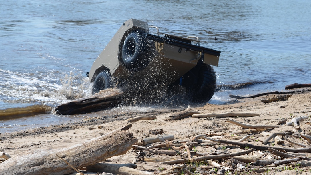 During a Marine Corps Intelligence Activity exercise May 5, the Multi-Utility Tactical Transport, or MUTT, is put through its paces at the Town of Quantico’s Riverside Park and in the Potomac River, Marine Corps Base Quantico, Virginia. The unmanned vehicle can carry up to 600 pounds; roll over boulders, sand and debris; and even swim.
