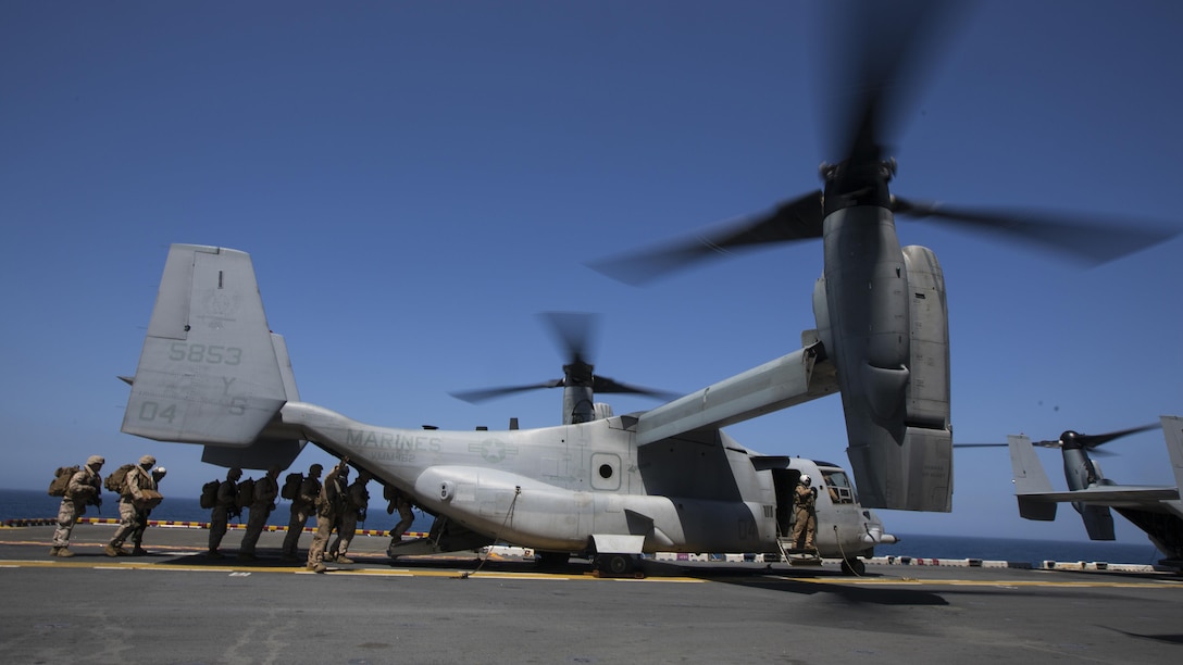 U.S. Marines with Golf Company, Battalion Landing Team 2/6, 26th Marine Expeditionary Unit, board an MV-22B Osprey while conducting flight operations aboard the USS Kearsarge (LHD 3), in the Atlantic Ocean, May 9, 2015, during PHIBRON-MEU Integrated Training. PMINT is a joint training event the 26th MEU, supporting elements and PHIBRON 4 are conducting in preparation for their deployment to the 5th and 6th Fleet areas of responsibility later this year. (U.S. Marine Corps photo by Lance Cpl. Andre Dakis/26th MEU Combat Camera/Released)