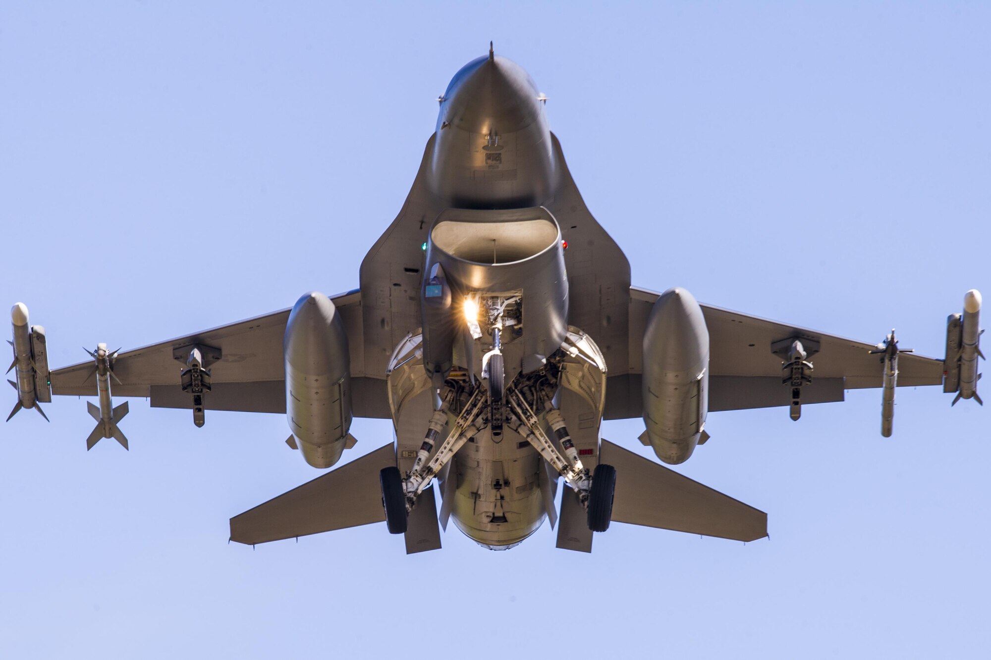 An F-16 Fighting Falcon assigned to the 13th Fighter Squadron, at Misawa Air Base, Japan, prepares to land on Eielson Air Force Base, Alaska, May 11, 2015, during Red Flag-Alaska 15-2. Red Flag is a series of Pacific Air Forces commander-directed field training exercises for U.S. and partner nation forces, providing combined offensive counter air, interdiction, close air support and large force employment training in a simulated combat environment. (U.S. Air Force photo/Staff Sgt. Joshua Turner)