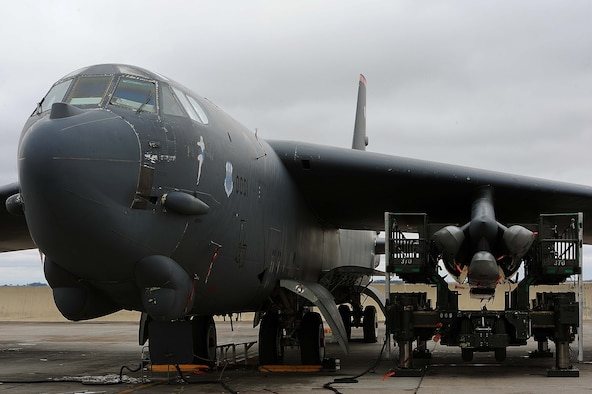 A B-52H Stratofortress sits on the flightline at Minot Air Force Base, N.D., after being loaded with air-launched cruise missiles during a Constant Vigilance aircraft generation exercise May 7, 2015. Air Force Global Strike Command routinely conducts training activities and exercises to ensure its forces are ready to perform nuclear deterrence and long-range strike operations. (U.S. Air Force photo/Senior Airman Kristoffer Kaubisch)