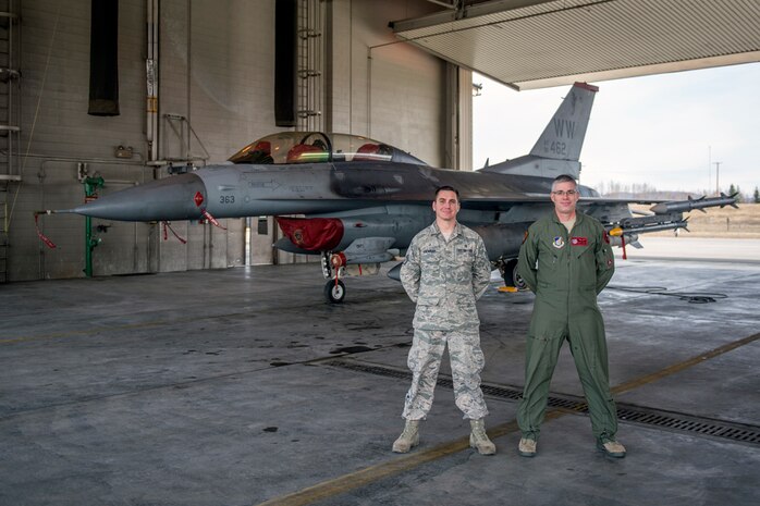 In this photo, Staff Sgt. Terrence Kneapler (left), an independent duty medical technician, and Maj. David Leary (right), the flight surgeon, both from the 13th Fighter Squadron, Misawa Air Base, Japan, take a break from seeing patients at Eielson Air Force Base, Alaska, May 5, 2015, while participating in RED FLAG-Alaska 15-2. They serve as the designated flight medicine team for visiting forces during the exercise. 