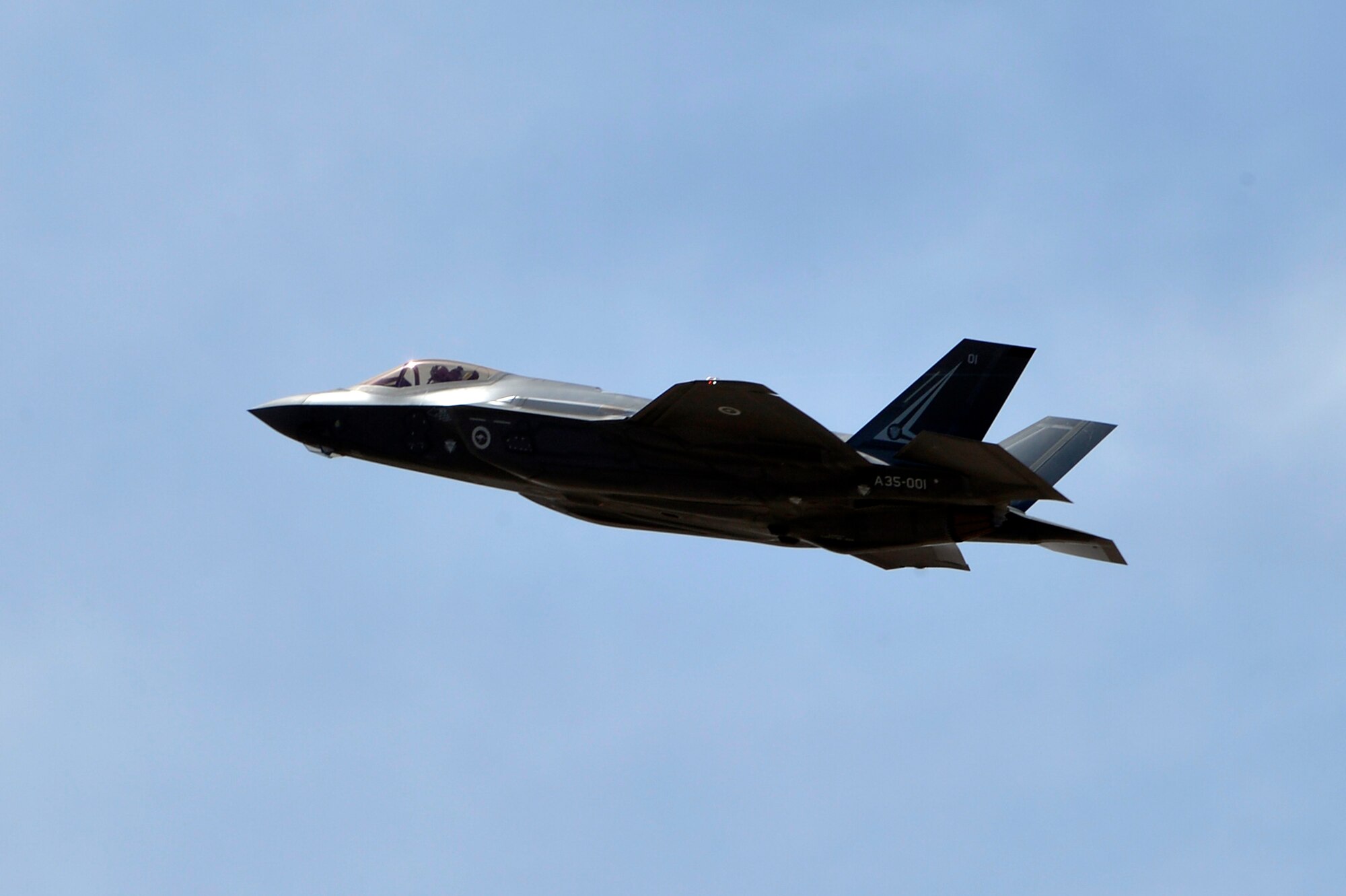 Royal Australian Air Force Maj. Andrew Jackson, 61st Fighter Squadron RAAF squadron leader, takes off in a RAAF F-35 A Lightning II at Luke Air Force Base, Arizona, May 14, 2015. This flight marks the first F-35 sortie for the RAAF. (U.S. Air Force photo by Senior Airman Devante Williams)