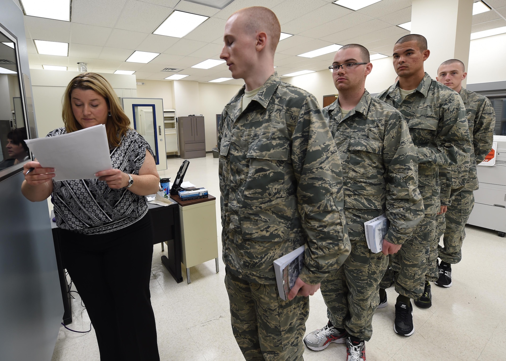 Audiology technician Tiffany Oliver verifies a Basic Military Trainee’s information prior to conducting a baseline hearing assessment May 12, 2015, on Joint Base San Antonio-Lackland, Texas. Smith is part of a five-member team responsible for conducting all BMT hearing assessments. (U.S. Air Force photo by Staff Sgt. Jerilyn Quintanilla) 