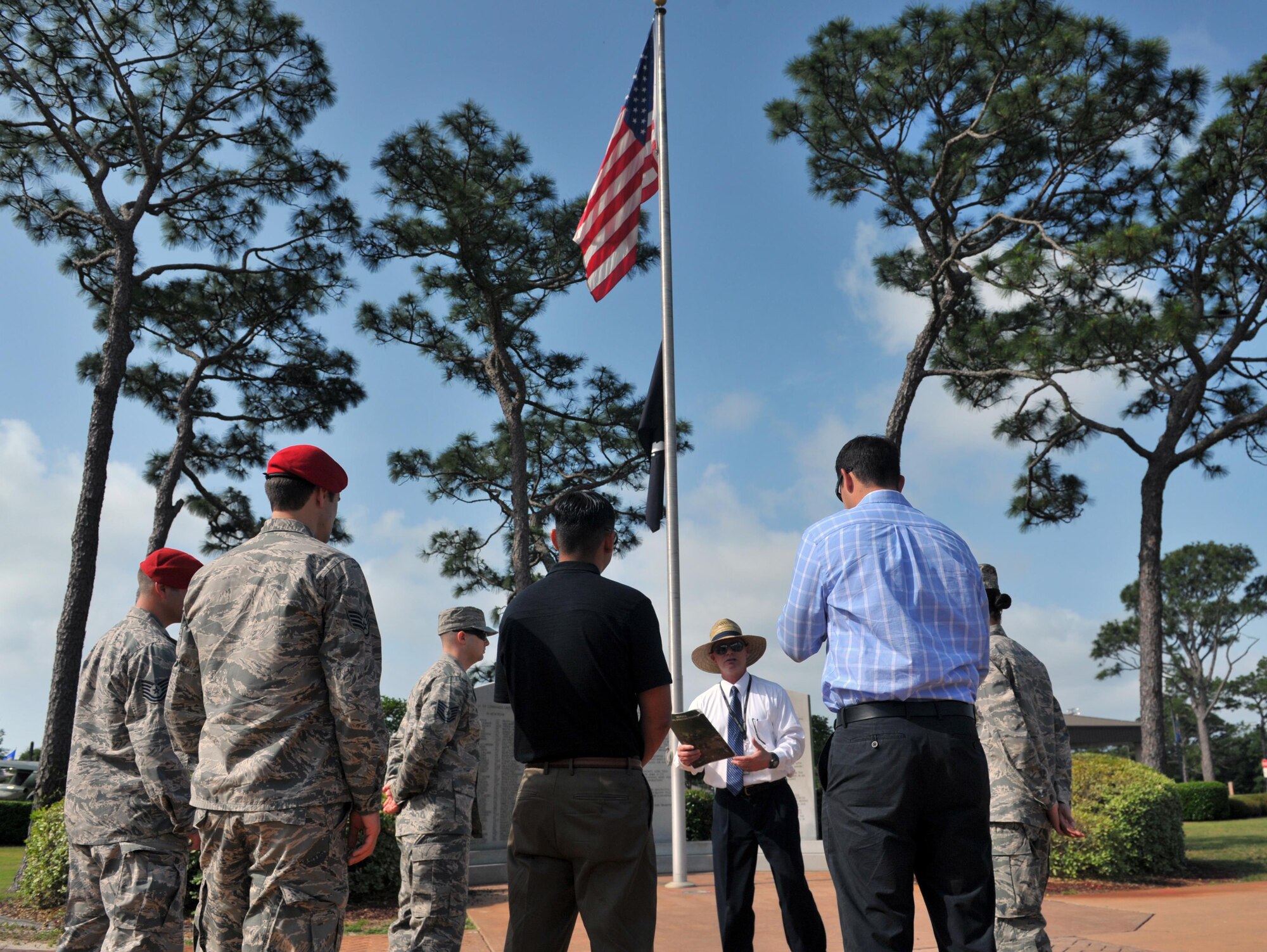 Air Force Special Operations Command's 2014 Airmen and civilians of the year tour the Hurlburt Field Heritage Park May 12.  These Airmen and civilians were honored at the annual awards banquet May 14 where the command also celebrated 25 years of history.