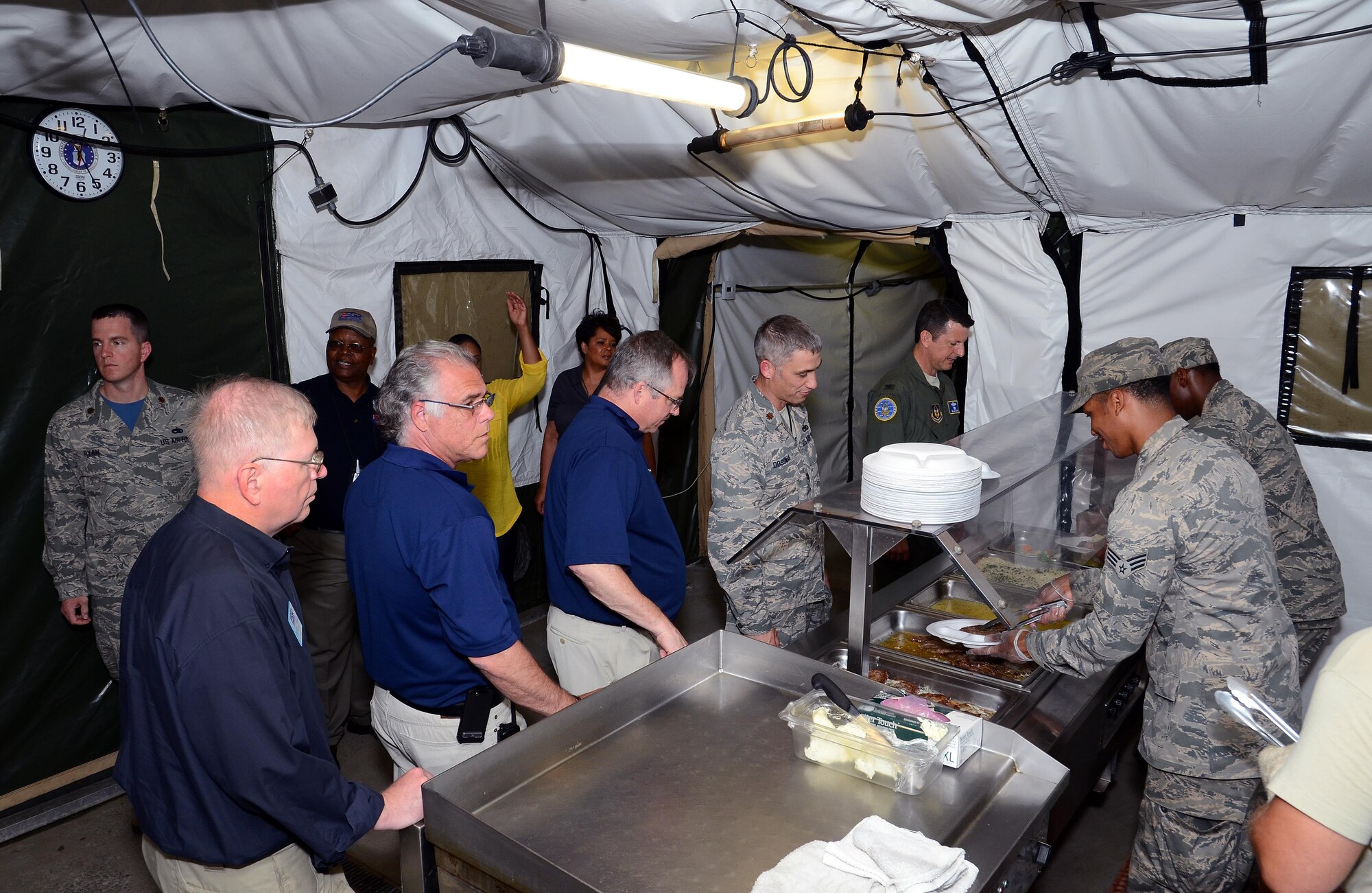 Members of the Employers Support of the Guard and Reserve tour the Force Support Silver Flag training facilities located at Dobbins Air Reserve Base, Ga., May 15, 2015. The ESGR tour of Dobbins ARB was arranged to provide a hands-on understanding of what their Air Force Reserve employees experience when deployed to the theater of operations. (U.S. Air Force photo/ Brad Fallin)