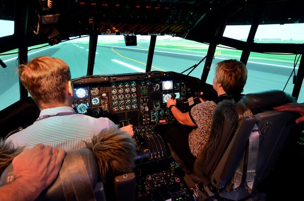 Members of the Employers Support of the Guard and Reserve took turns flying the C-130 Eastern Regional Flight Simulator at Dobbins Air Reserve Base, Ga., May 15, 2015. The ESGR tour of Dobbins ARB was arranged to provide a hands-on understanding of what their Air Force Reserve employees experience when deployed to the theater of operations. (U.S. Air Force photo/ Brad Fallin)