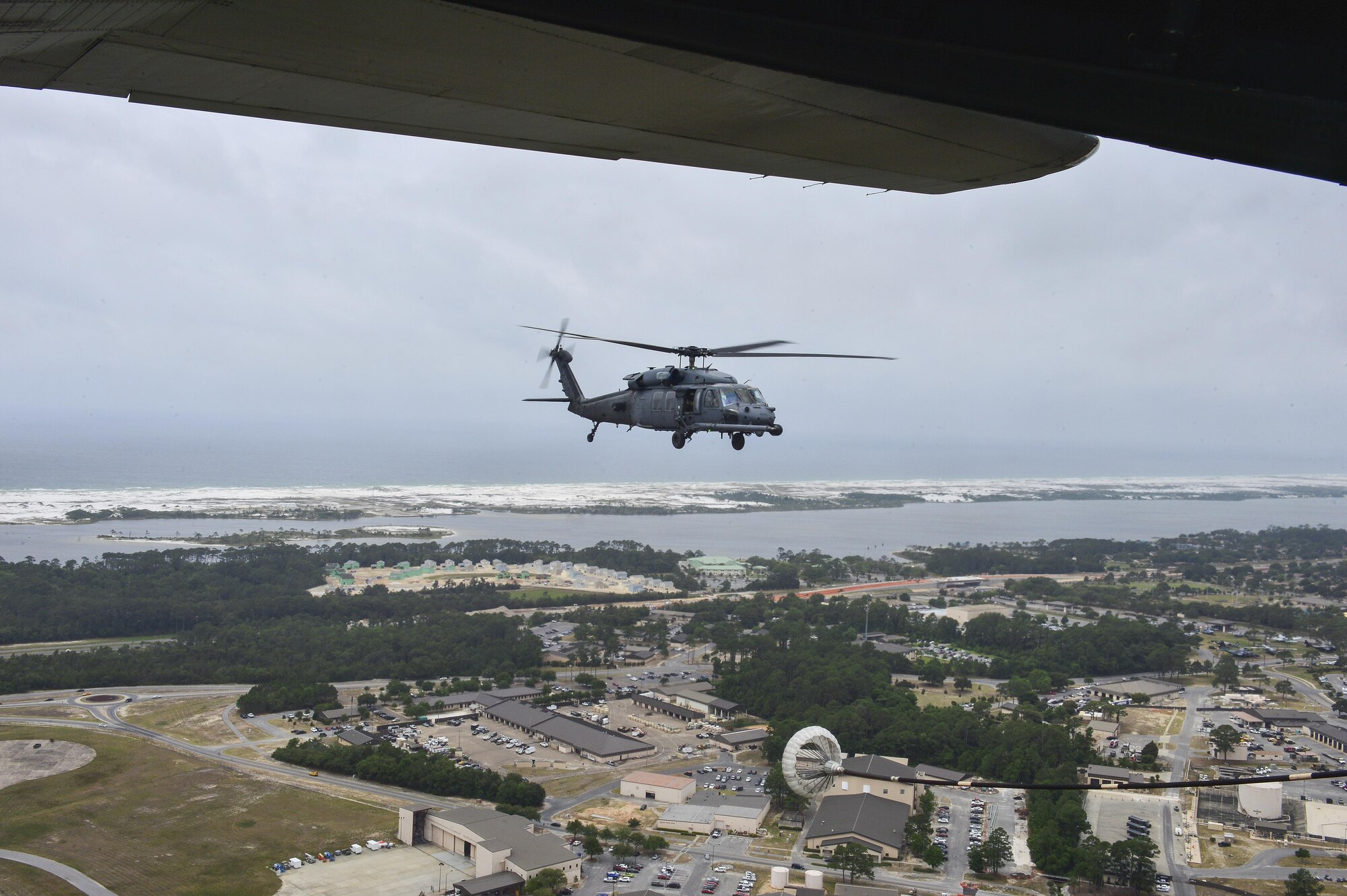 An HH-60G Pave Hawk helicopter from the 41st Rescue Squadron, Moody Air Force Base, Ga., performs an air-toair refueling with an MC-130P Combat Shadow over Hurlburt Field, Fla., May 15, 2015. The final two MC-130P Combat Shadow aircraft in the Air Force landed for the last time at Hurlburt Field, Fla., in front of more than 400 people and will take their last flight to the boneyard at Davis-Monthan Air Force Base, Arizona, June 1. (U.S. Air Force photo/Senior Airman Jeff Parkinson)