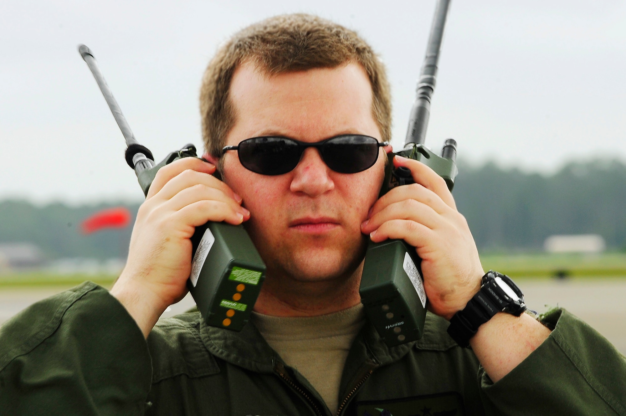 Capt. Tim Nettles, 1st Special Operations Group Detachment 1 pilot, listens to instructions from the MC-130P Combat Shadow aircraft during a heritage flight at Hurlburt Field Fla., May 15, 2015. Aircrafts 66-0217 and 69-5819 are the last two MC-130P Combat Shadow aircraft in the Air Force to be retired. On June 1, 217 and 819 will take their last flight to the boneyard at Davis-Monthan Air Force Base, Arizona. (U.S. Air Force photo/Airman 1st Class Andrea Posey)