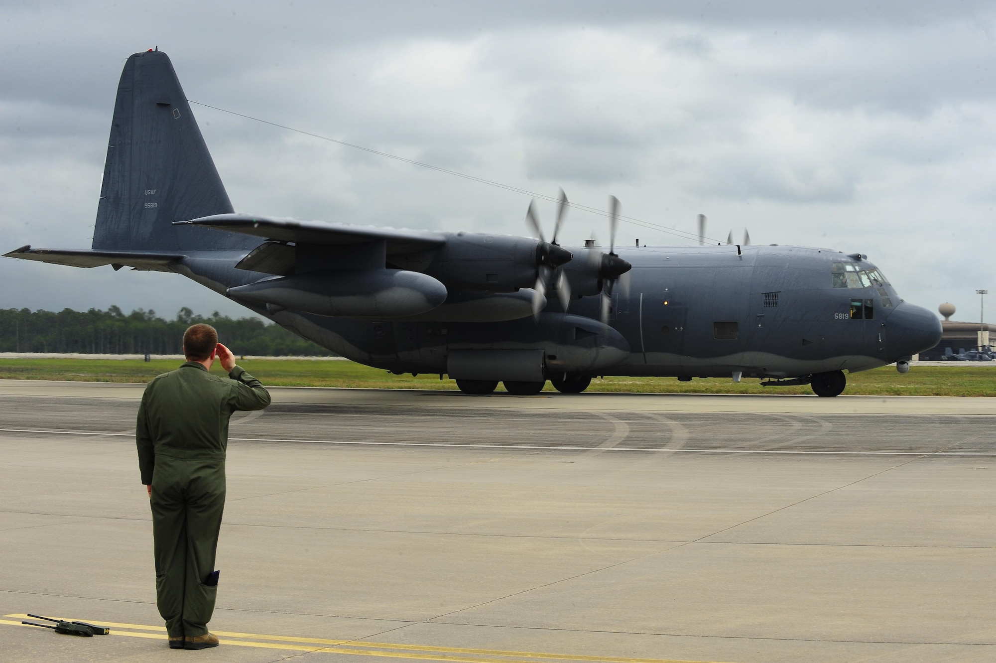 Capt. Tim Nettles, 1st Special Operations Group Detachment 1 pilot, salutes the MC 130 P Combat Shadow at Hurlburt Field Fla., May 15, 2015. Since Desert Storm, the MC-130P has been involved in many operations: Northern and Southern Watch, Deny Flight in Yugoslavia, Restore Democracy and Uphold Democracy in Haiti, Deliberate Force and Joint Endeavor in Bosnia, Assured Response in Liberia, Guardian Retrieval from Zaire, Enduring Freedom in Afghanistan, Iraqi Freedom, New Dawn and Odyssey Dawn. (U.S. Air Force photo/Airman 1st Class Andrea Posey)
