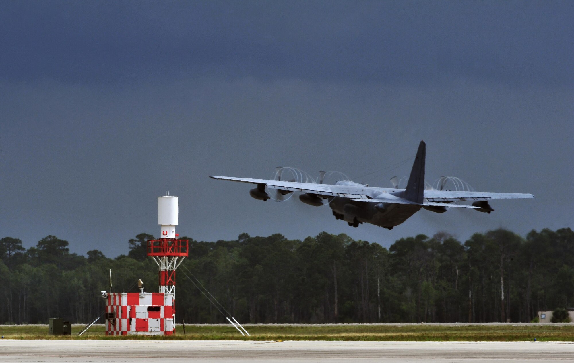 An MC-130P Combat Shadow takes off on its final flight, May 15, 2015, at Hurlburt Field, Fla. Aircrafts 66-0217 and 69-5819 are the last two MC-130P Combat Shadow aircraft in the Air Force to be retired. On June 1, 217 and 819 will take their last flight to the boneyard at Davis-Monthan Air Force Base, Arizona. (U.S. Air Force photo/Airman 1st Class Ryan Conroy) 
