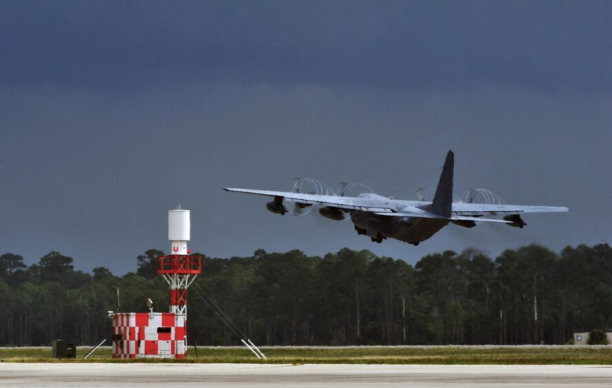 An MC-130P Combat Shadow takes off on its final flight, May 15, 2015, at Hurlburt Field, Fla. Aircrafts 66-0217 and 69-5819 are the last two MC-130P Combat Shadow aircraft in the Air Force to be retired. On June 1, 217 and 819 will take their last flight to the boneyard at Davis-Monthan Air Force Base, Arizona. (U.S. Air Force photo/Airman 1st Class Ryan Conroy) 
