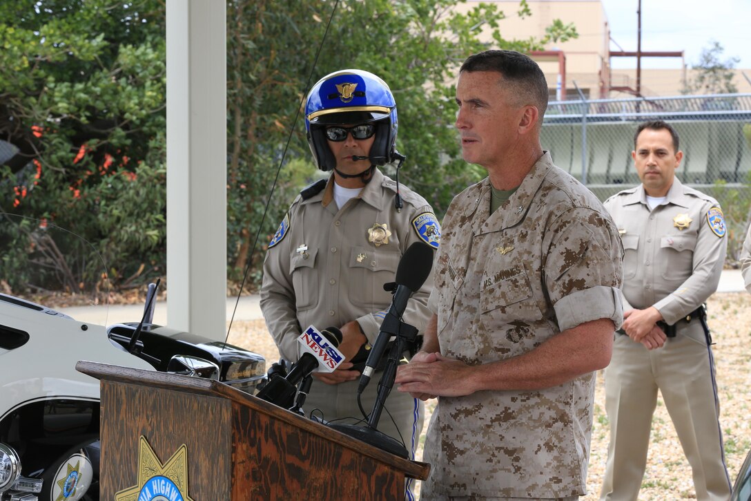 Col. John Farnam, Marine Corps Air Station Miramar commanding officer, makes a speech during a motorcycle safety awareness press conference aboard MCAS Miramar, California, May 14. Leaders with Marine Corps Air Station Miramar, California Highway Patrol and San Diego Police Department held the conference to emphasize the importance of motorcycle safety.