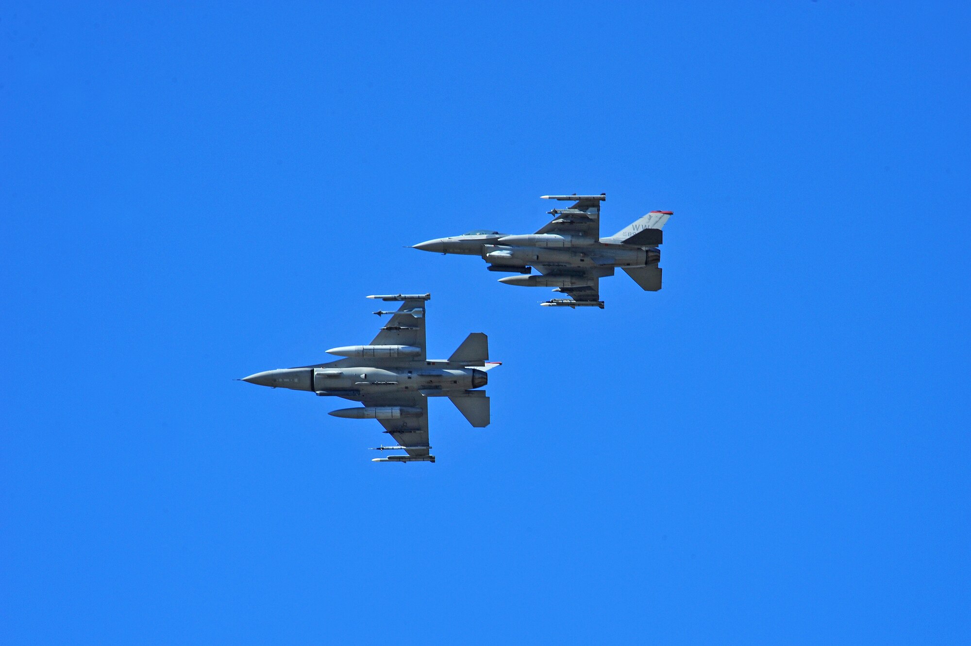 U.S. Air Force F-16 Fighting Falcon aircraft assigned to the 13th Fighter Squadron, Misawa Air Base, Japan, prepare to land May 14, 2015, after a RED FLAG-Alaska (RF-A) 15-2 mission at Eielson Air Force Base, Alaska. Conducting RF-A training signifies U.S. continued commitment to our Asia-Pacific allies and partners. (U.S. Air Force photo by Tech. Sgt. Miguel Lara III/Released)