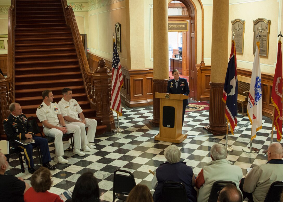 Col. Tracy Hayes, 90th Missile Wing commander speaks at a Military Appreciation Day proclamation signing event in the Wyoming Capitol May 15, 2015. The event honored the men and women who have served our country. (U.S. Air Force Photo by Lan Kim)