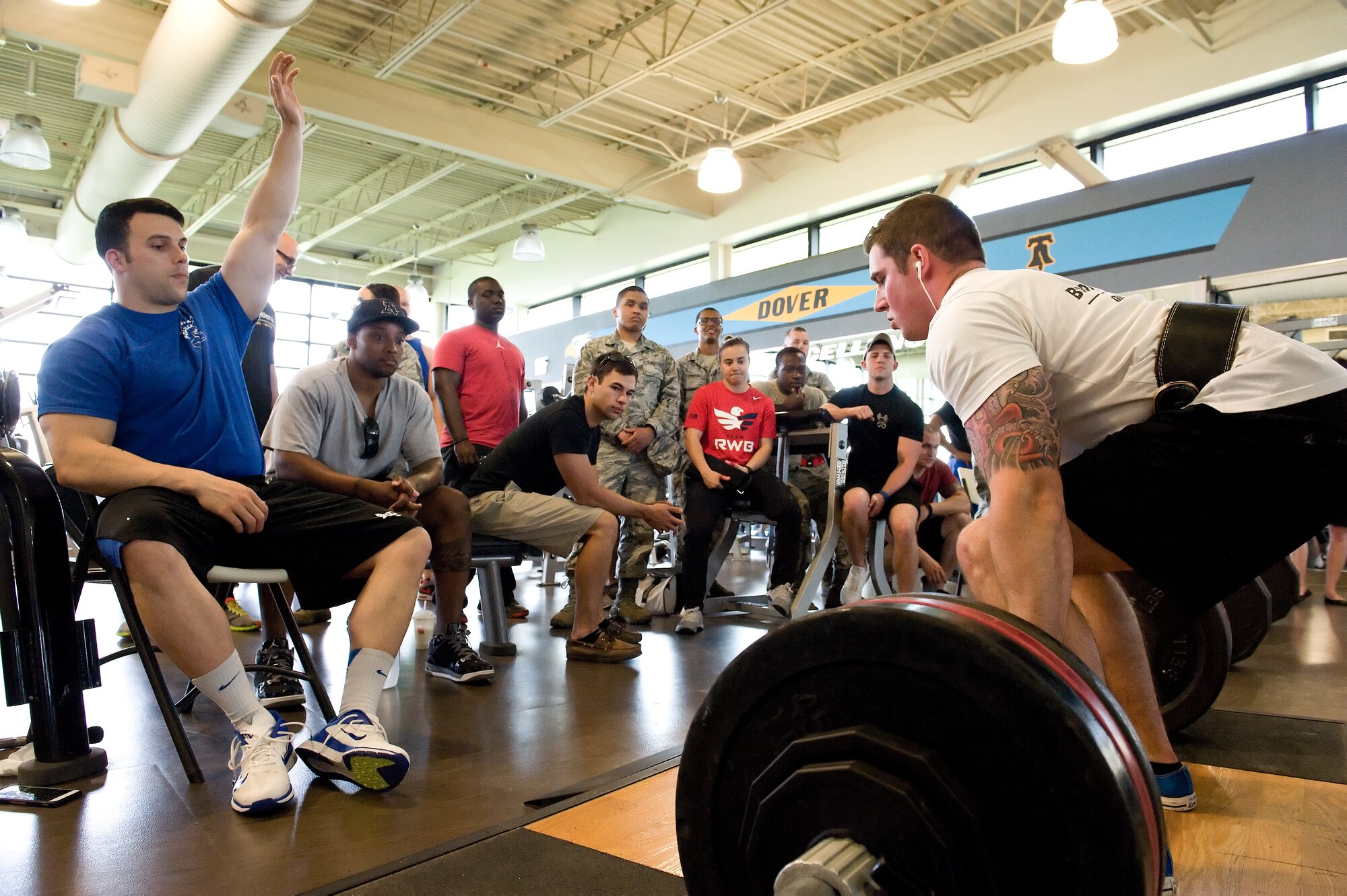 Deadlifting judge Scott Day, left, waits for Richard Dougherty, right, to lift 495 pounds on his second of three deadlift attempts during the powerlifting competition May 8, 2015, at the Fitness Center on Dover Air Force Base, Del. Dougherty placed third in the male 220-pound weight class with a combined total of 1,165 pounds for the squat, bench press and deadlift. (U.S. Air Force photo/Roland Balik)