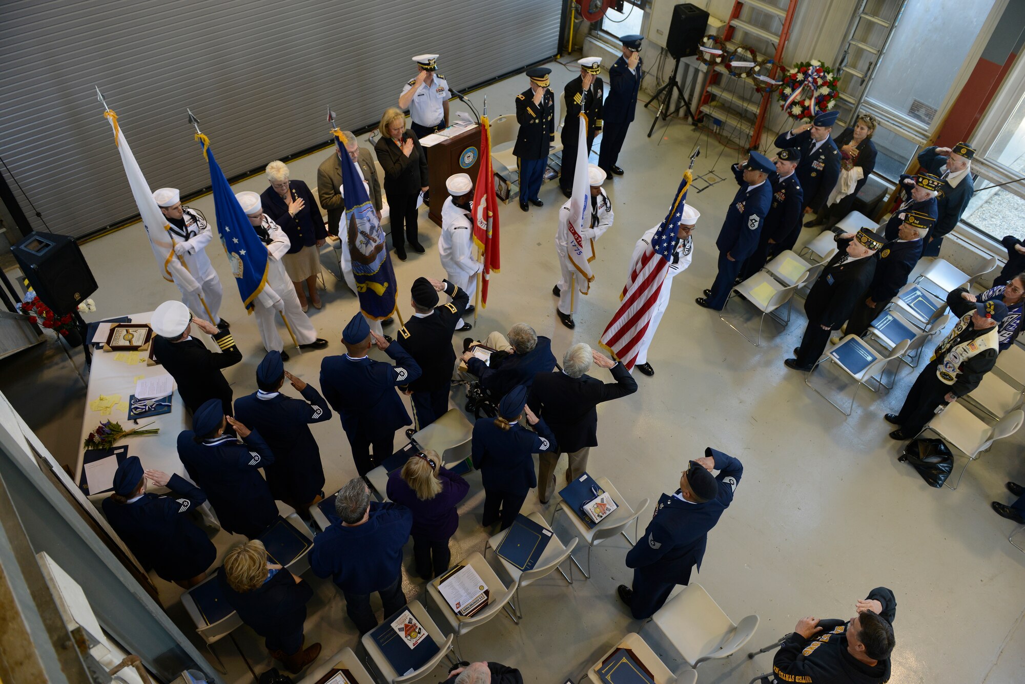 Chief Warrant Officer Kevin Speer, the commanding officer of Coast Guard Station Barnegat Light, N.J., gives his opening remarks during the 71st Anniversary of Exercise Tiger in Barnegat Light, N.J., Tuesday, April 28, 2015. The ceremony honors the Soldiers and Sailors who lost their lives during the World War II Battle of Exercise Tiger, April 28, 1944. (U.S. Coast Guard photo by Petty Officer 3rd Class David Micallef/Released)