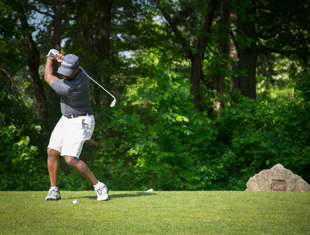 Col. Eric Chapital, National Defense University student, swings from the tee box during the 2015 National Police Week golf tournament at Joint Base Andrews, Md., May 12, 2015. Established by a joint resolution of Congress in 1962, NPW pays special recognition to those law enforcement officers who have lost their lives in the line of duty for the safety and protection of others. (U.S. Air Force photo/Airman 1st Class Ryan J. Sonnier)