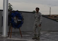ALTUS AIR FORCE BASE, Okla. – U.S. Air Force Senior Airman Julian Metcalf, 97th Security Forces Squadron fire team leader, guards a wreath at the Wings of Freedom Park, May 15, 2015. The wreath is placed in honor of fallen law enforcement officers who have lost their lives in the line of duty. (U.S. Air Force photo by Senior Airman J. Zuriel Lee/Released)