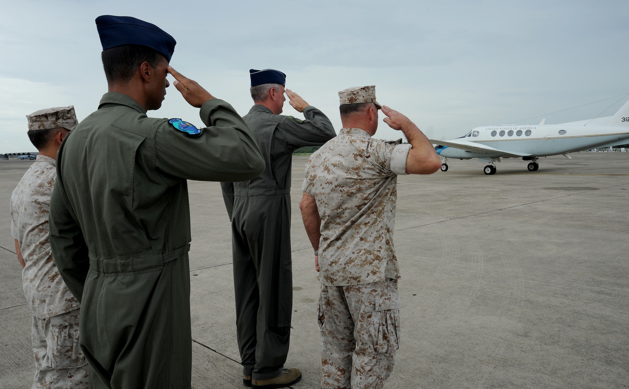 Joint Task Force-505 leaders see off W. Patrick Murphy, Chargé d’affaires of the U.S. Embassy in Thailand, after his visit to Utapao Royal Thai Naval Airfield, Thailand, May 14, 2015. Joint Task Force-505 designated Utapao an Intermediate Staging Base that ensures earthquake relief supplies and personnel flow in and out of Nepal. U.S. and Royal Thai Armed Forces are working together at the ISB to coordinate humanitarian aid and disaster relief efforts for the government and people of Nepal. (U.S. Air Force photo by Staff Sgt. Alexander Martinez/Released)