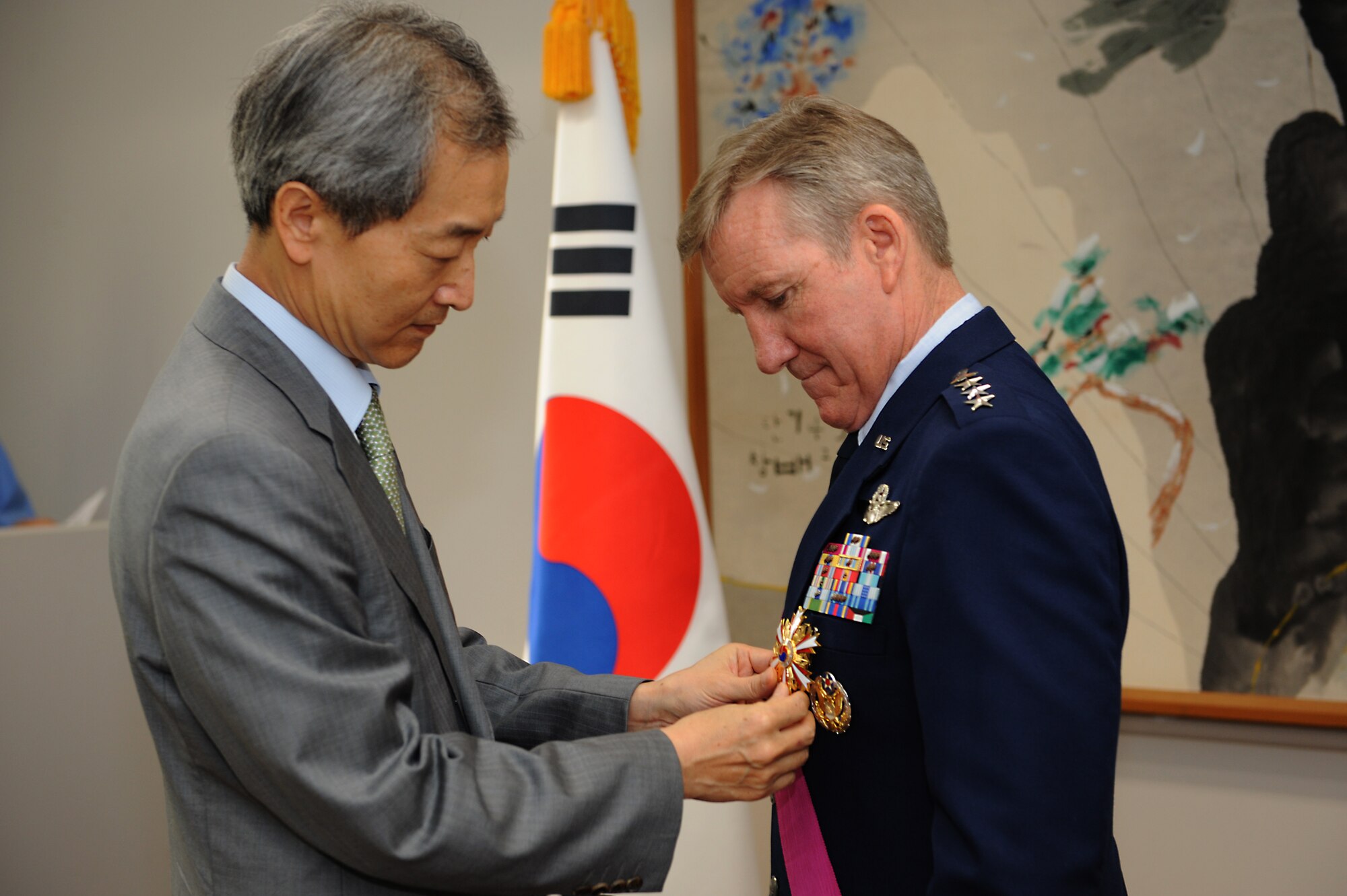Ahn Ho-Young, the Ambassador Extraordinary and Plenipotentiary of the Republic of Korea to the United States of America, pins the Order of National Security Merit Tongil Medal on Gen. Hawk Carlisle, commander of Air Combat Command, at the Embassy of the Republic of Korea in Washington, D.C. May 12, 2015. Carlisle was awarded for his service in promoting military cooperation between the Republic of Korea and the United States. (U.S. Air Force photo by Tech. Sgt. Dan DeCook/Released)