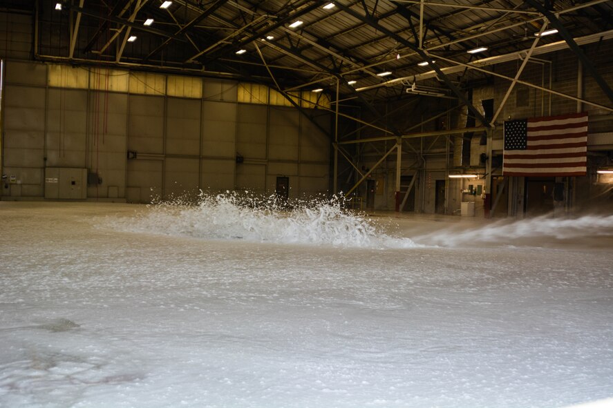 Foam is released in the Newlon Hangar during a function test at Rosecrans Air National Guard Base, St. Joseph, Mo., May 14, 2015. The foam is designed to suppress fires that may occur in the hangar. (U.S. Air National Guard photo by Morgan Calvert)