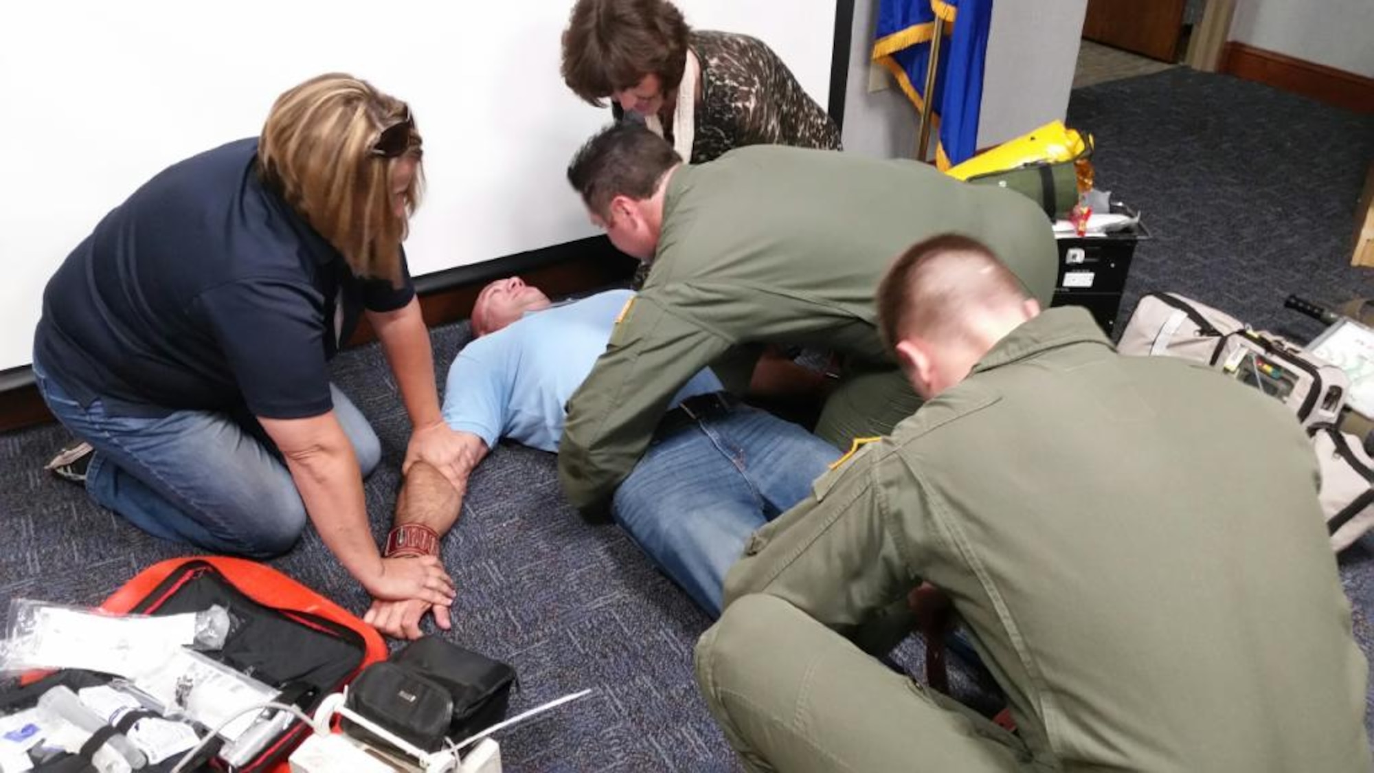 Associates from the 403rd Wing, an Air Force Reserve unit based out of Keesler Air Force Base, Miss., participated in a restraint sequence during a briefing from the 45th Aeromedical Squadron. The 927th Air Refueling Wing, MacDill Air Force Base, Fla., hosted the visiting civics for a two day educational tour, May 14-15. (U.S. Air Force photo/Tech. Sgt. Pete Dean)        