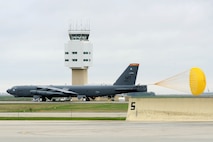 A B-52H Stratofortress deploys a parachute while landing at Minot Air Force Base, N.D., following a Constant Vigilance mission sortie May 13, 2015. Air Force Global Strike Command routinely conducts training operations and exercises such as Constant Vigilance to ensure its forces can perform their nuclear deterrence and long-range strike missions if and when called upon to do so. (U.S. Air Force photo/Senior Airman Kristoffer Kaubisch)