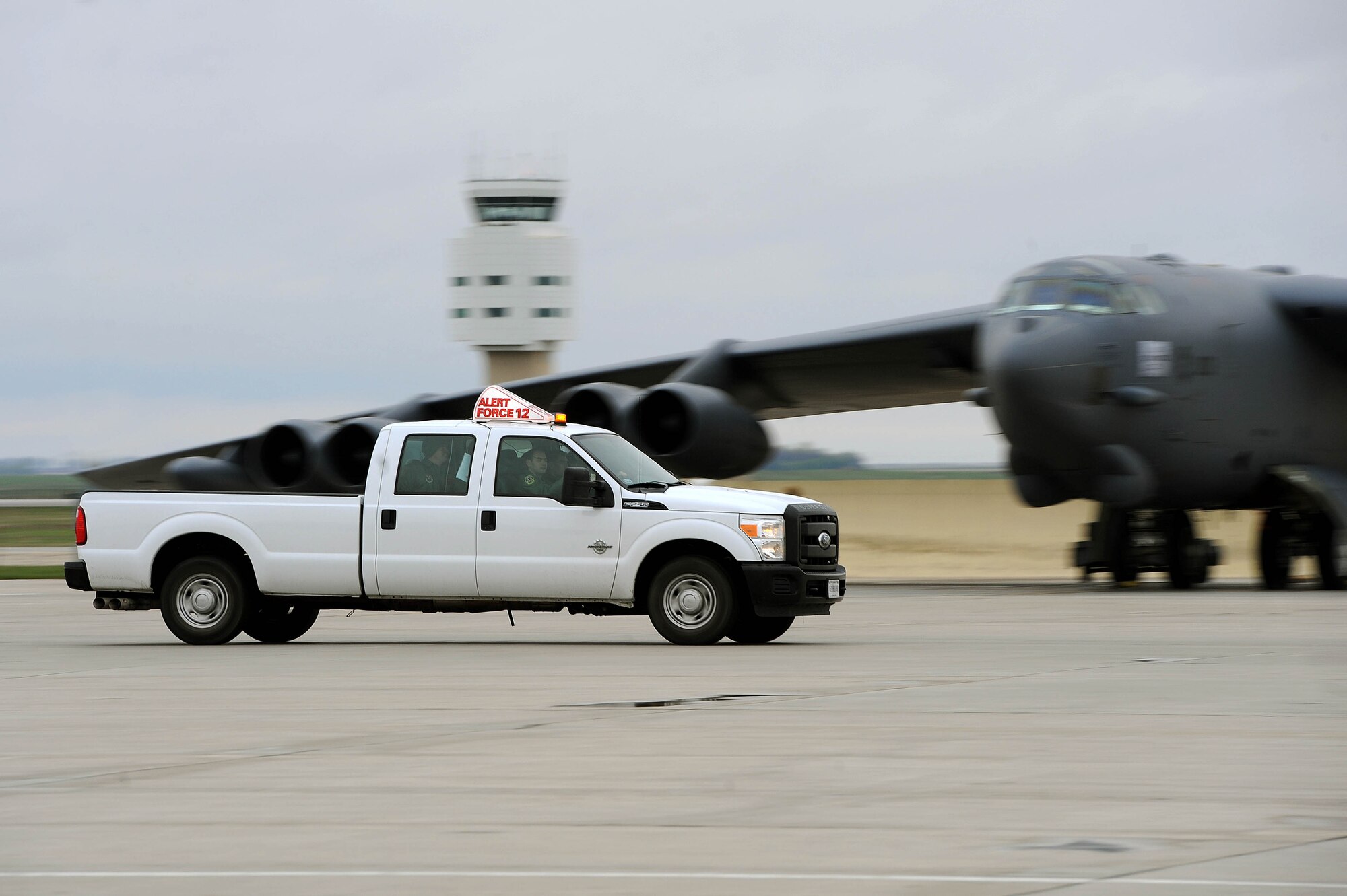 B-52H Stratofortress alert aircrew members scramble to their aircraft during a Constant Vigilance rapid launch exercise at Minot Air Force Base, N.D., May 13, 2015. The rapid launch event tested the ability of aircrews, maintainers and other base agencies ability to work together and quickly provide the President and combatant commanders with airborne nuclear deterrence and long-range strike capabilities if and when called upon to do so. (U.S. Air Force photo/Senior Airman Kristoffer Kaubisch)