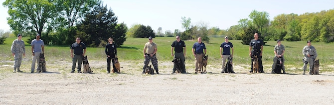 Seven local K-9 police departments train with the 509th Security Forces Squadron military working dog section at Whiteman Air Force Base, Mo., April 30, 2015. The training included vehicle extractions, scout and apprehending suspects and building challenges. (U.S. Air Force photo by Staff Sgt. Alexandra M. Longfellow/Released)