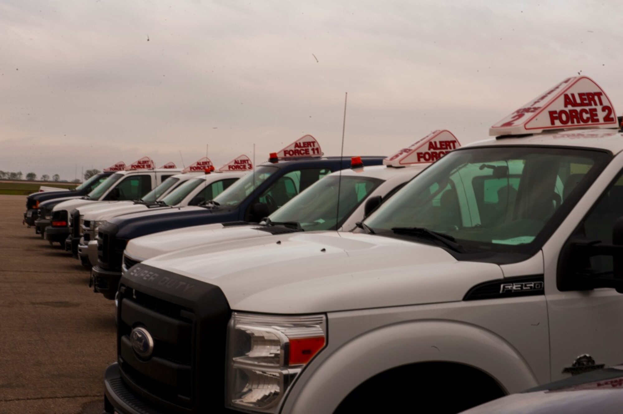 Alert vehicles are staged on the Minot Air Force Base, N.D., flightline ready to rapidly transport aircrews to their aircraft during Constant Vigilance May 13, 2015. An annual Air Force Global Strike Command exercise, Constant Vigilance is designed to train and assess the command's ability to perform its conventional and nuclear missions. (U.S. Air Force photo/Airman 1st Class Christian Sullivan)