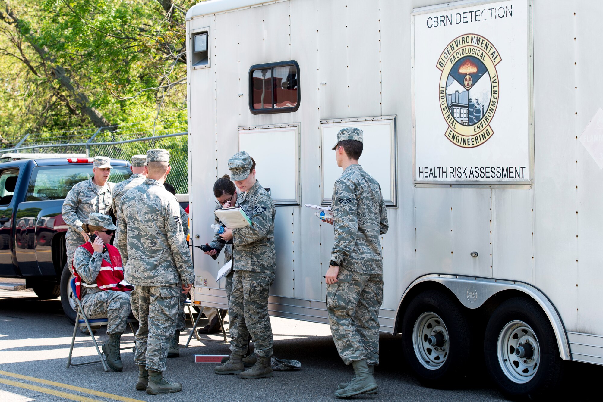 Wright-Patterson environmental team works together to assess potential environmental hazards and health risks in result of a tornado during the base exercise May 7 at WPAFB.