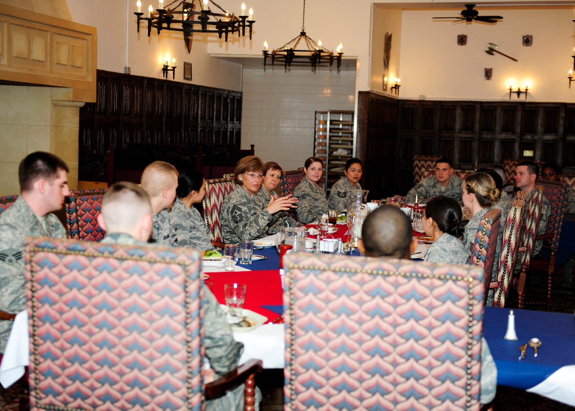 U.S. Air Force Chief Master Sgt. Victoria Gamble, Air Mobility Command command chief, mentors 100th Air Refueling Wing Airmen during a breakfast at the Gateway dining facility April 21, 2015, on RAF Mildenhall, England. Gamble discussed career progression, educational opportunities, new Air Force policies and answered questions from the attendees. The breakfast was part of a one-day tour across the installation. (U.S. Air Force Photo by Staff Sgt. Krystie Martinez/Released)