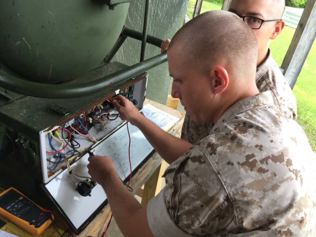 Marines from BEEEST 5-15 conduct practical application on an M-80.