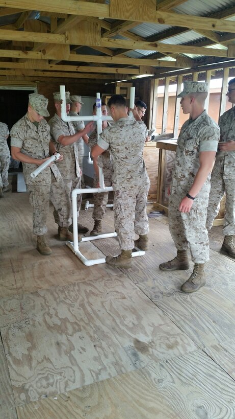 Marines from BWST 5-15 learn about plumbing.