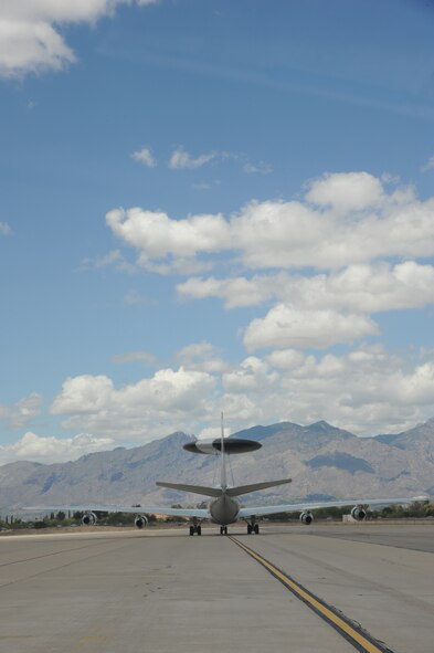 An E-3 Airborne Warning and Control System aircraft from Tinker Air Force Base, Okla., taxis at Davis-Monthan AFB, Ariz., May 16, 2015. Eight AWACS arrived here her due to tornado alerts in Oklahoma. The AWACS maximum takeoff weight is 347,000 lbs and is 41 feet, 4 inches tall and 145 feet, 6 inches in length. (U.S. Air Force photo by Senior Airman Betty R. Chevalier)