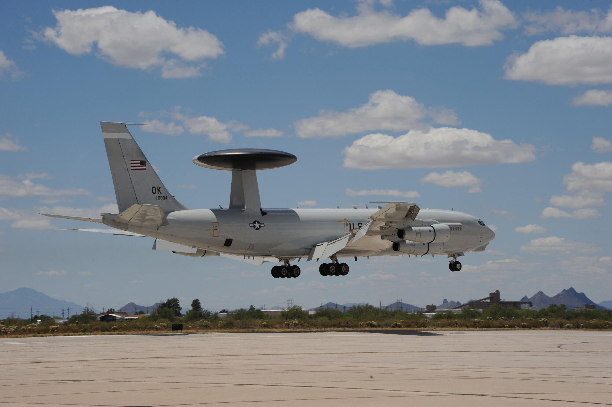 An E-3 Airborne Warning and Control System aircraft from Tinker Air Force Base, Okla., prepares to land at Davis-Monthan AFB, Ariz., May 16, 2015. Eight AWACS arrived here due to tornado alerts in Oklahoma.  AWACS provide all-weather surveillance, command, control and communications needed by commanders of U.S. and NATO air defense forces. (U.S. Air Force photo by Senior Airman Betty R. Chevalier)