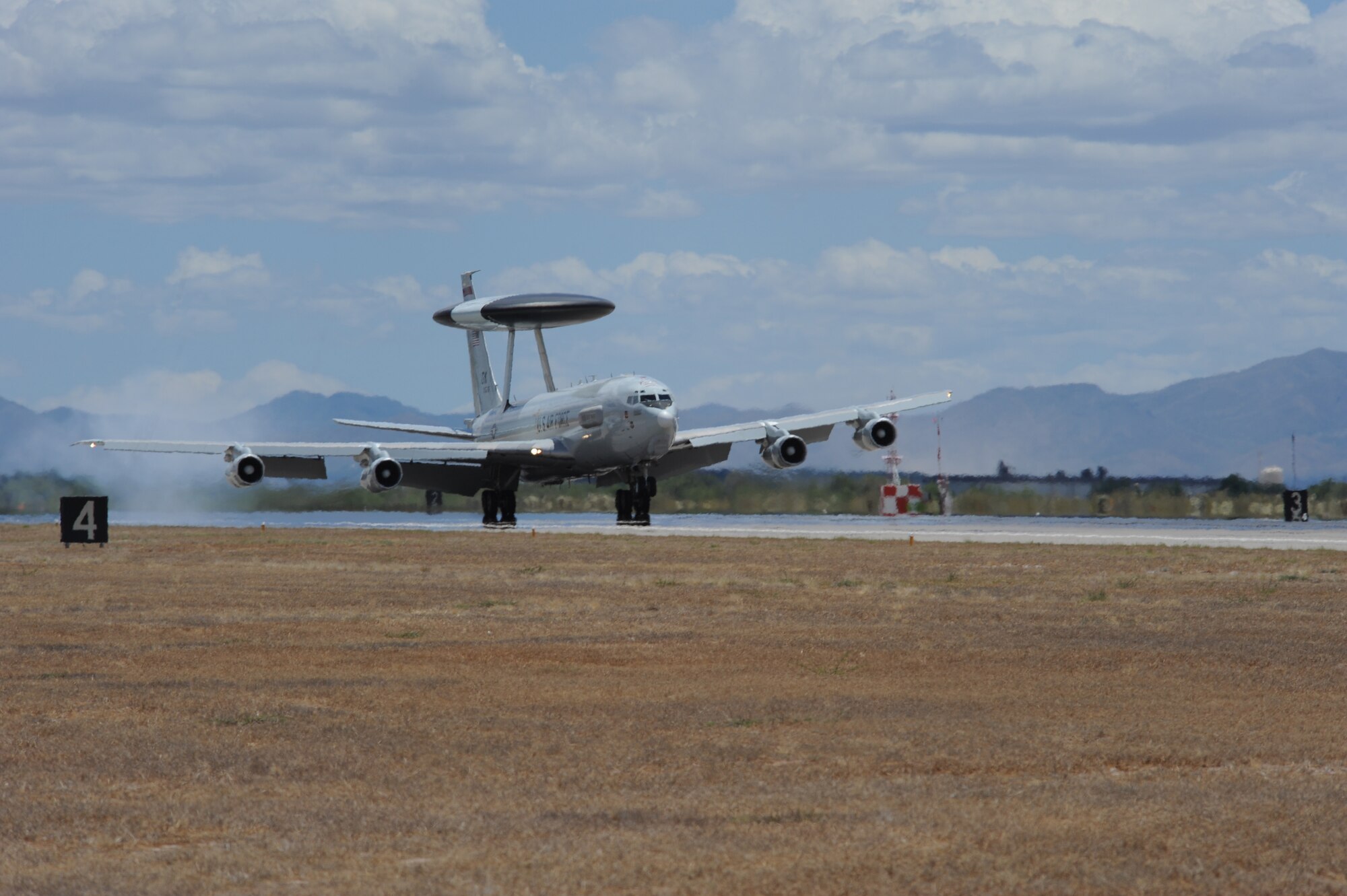 An E-3 Airborne Warning and Control System aircraft from Tinker Air Force Base, Okla., lands on the flightline at Davis-Monthan AFB, Ariz., May 16, 2015. Eight AWACS arrived here due to tornado alerts in Oklahoma. The AWACS are assigned to the 963rd Airborne Air Control Squadron from the 552nd Air Control Wing. (U.S. Air Force photo by Senior Airman Betty R. Chevalier)