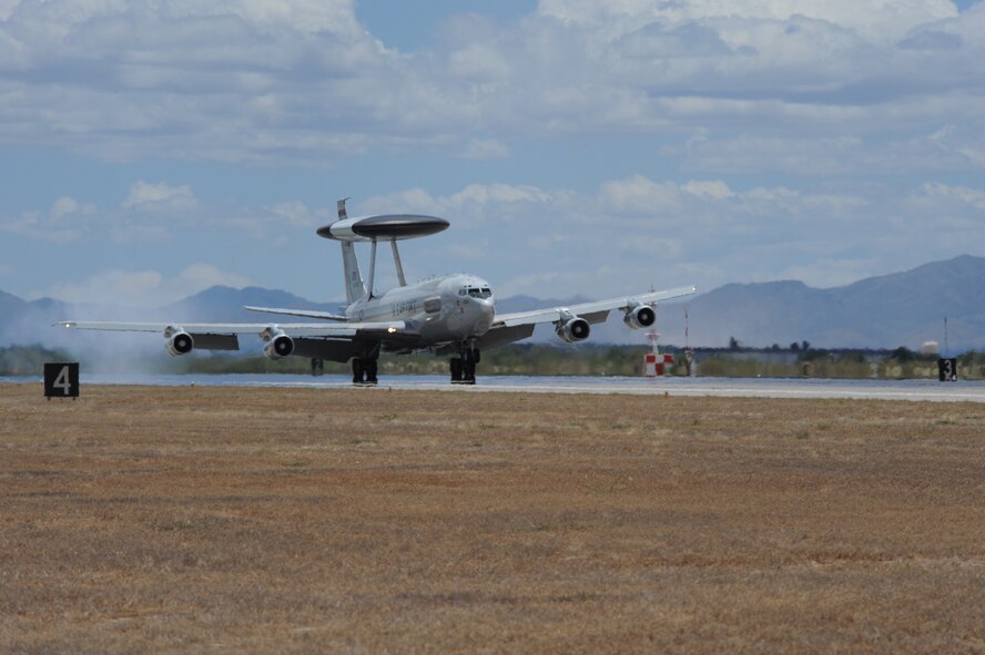 An E-3 Airborne Warning and Control System aircraft from Tinker Air Force Base, Okla., lands on the flightline at Davis-Monthan AFB, Ariz., May 16, 2015. Eight AWACS arrived here due to tornado alerts in Oklahoma. The AWACS are assigned to the 963rd Airborne Air Control Squadron from the 552nd Air Control Wing. (U.S. Air Force photo by Senior Airman Betty R. Chevalier)