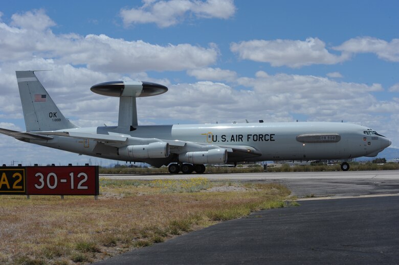 An E-3 Airborne Warning and Control System aircraft from Tinker Air Force Base, Okla., lands on the flightline at Davis-Monthan AFB, Ariz., May 16, 2015. Eight AWACS arrived here due to tornado alerts in Oklahoma. The AWACS maximum takeoff weight is 347,000 lbs and is 41 feet, 4 inches tall and 145 feet, 6 inches in length. (U.S. Air Force photo by Senior Airman Betty R. Chevalier)